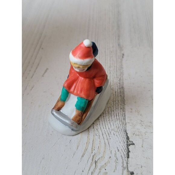Red girl snow sledding village accessory xmas decor - Picture 1 of 6